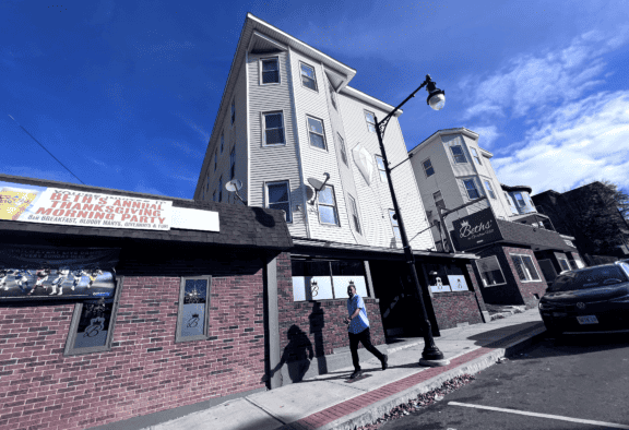 structure, building, billboard, architecture, signboard, cinema, sky, house, city, theater, exterior, old, travel, town, roof, construction, facade, urban, tourism, church, landmark, tower, brick, window, street, ancient, windows, buildings, office, home, business, modern, village, cityscape, sign, clouds, wall, history, houses, perspective, built, new, estate, destination, stone, traditional, residential, design, famous, center, religion, high, architectural, apartment, historical, monument, historic, bank, road, property, summer, skyscraper, england, cross, balcony, glass